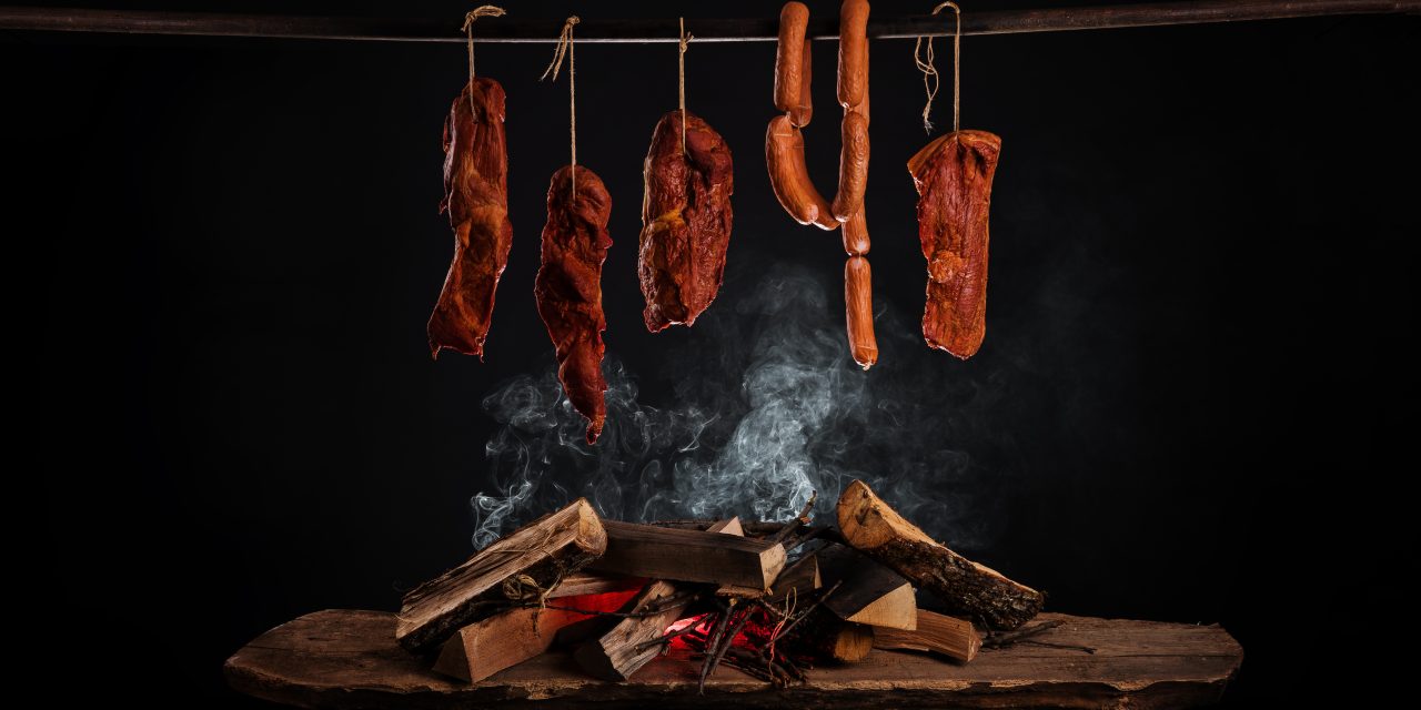Smoked,Ham,,Bacon,,Pork,Neck,And,Sausages,In,A,Smokehouse.