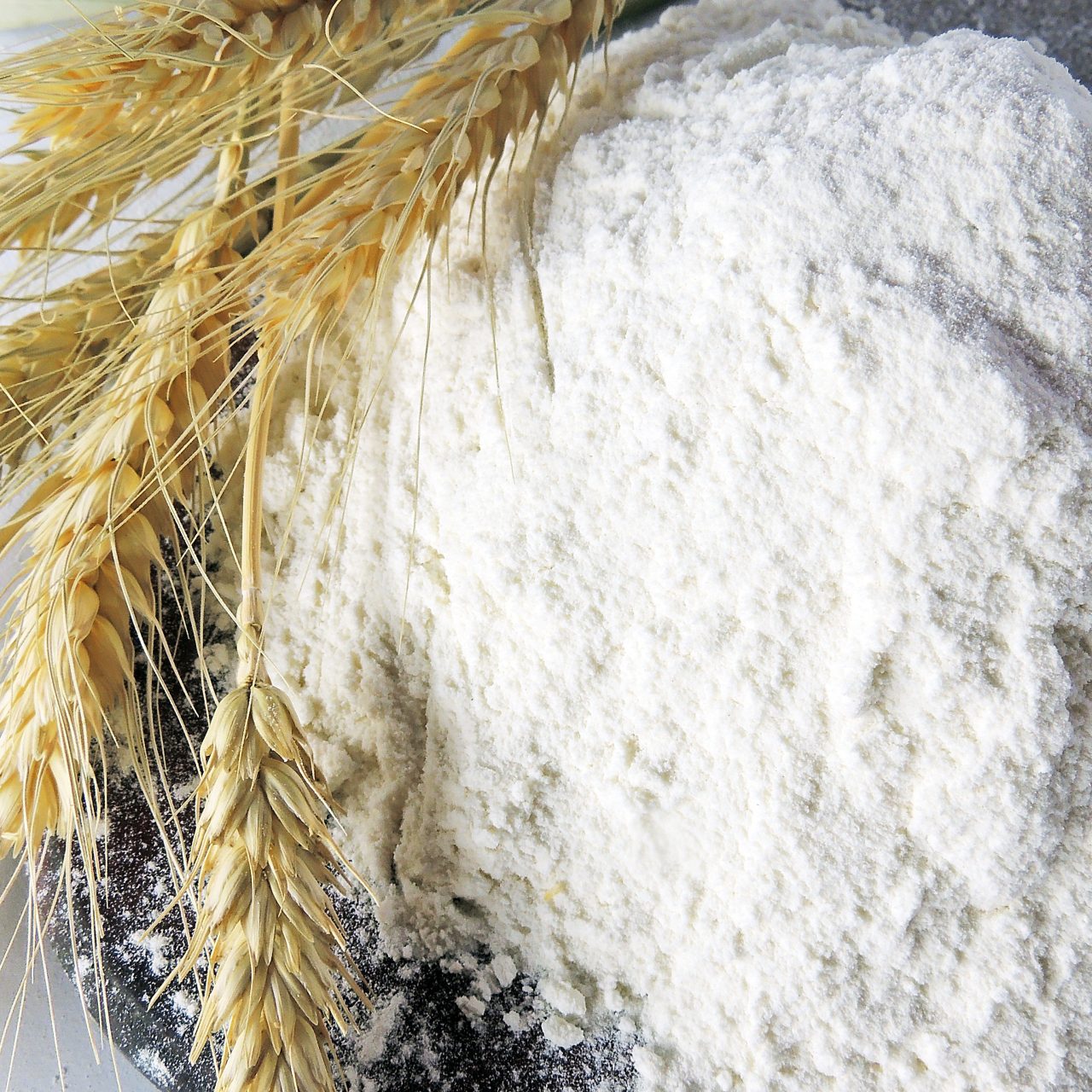 Heap,Of,Wheat,Flour,With,Spikelets,Isolated,On,White